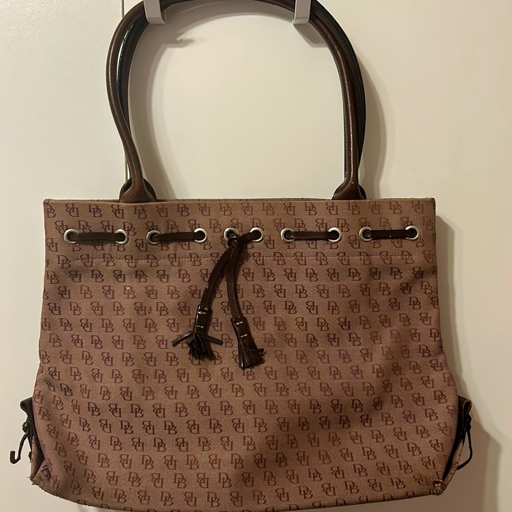 Purple bag with brown straps from dooney & bourke